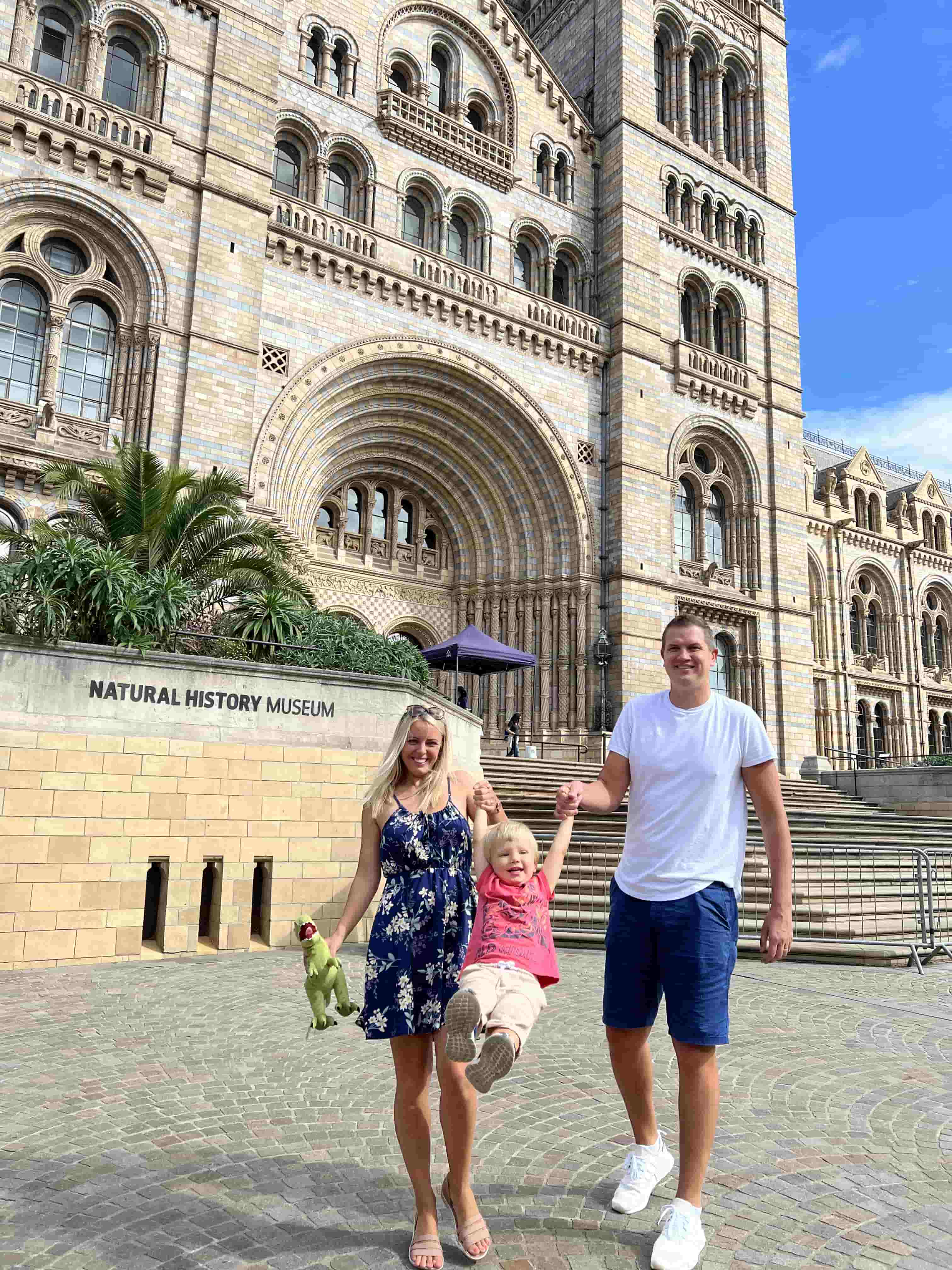 Family spending time in National History Museum in London